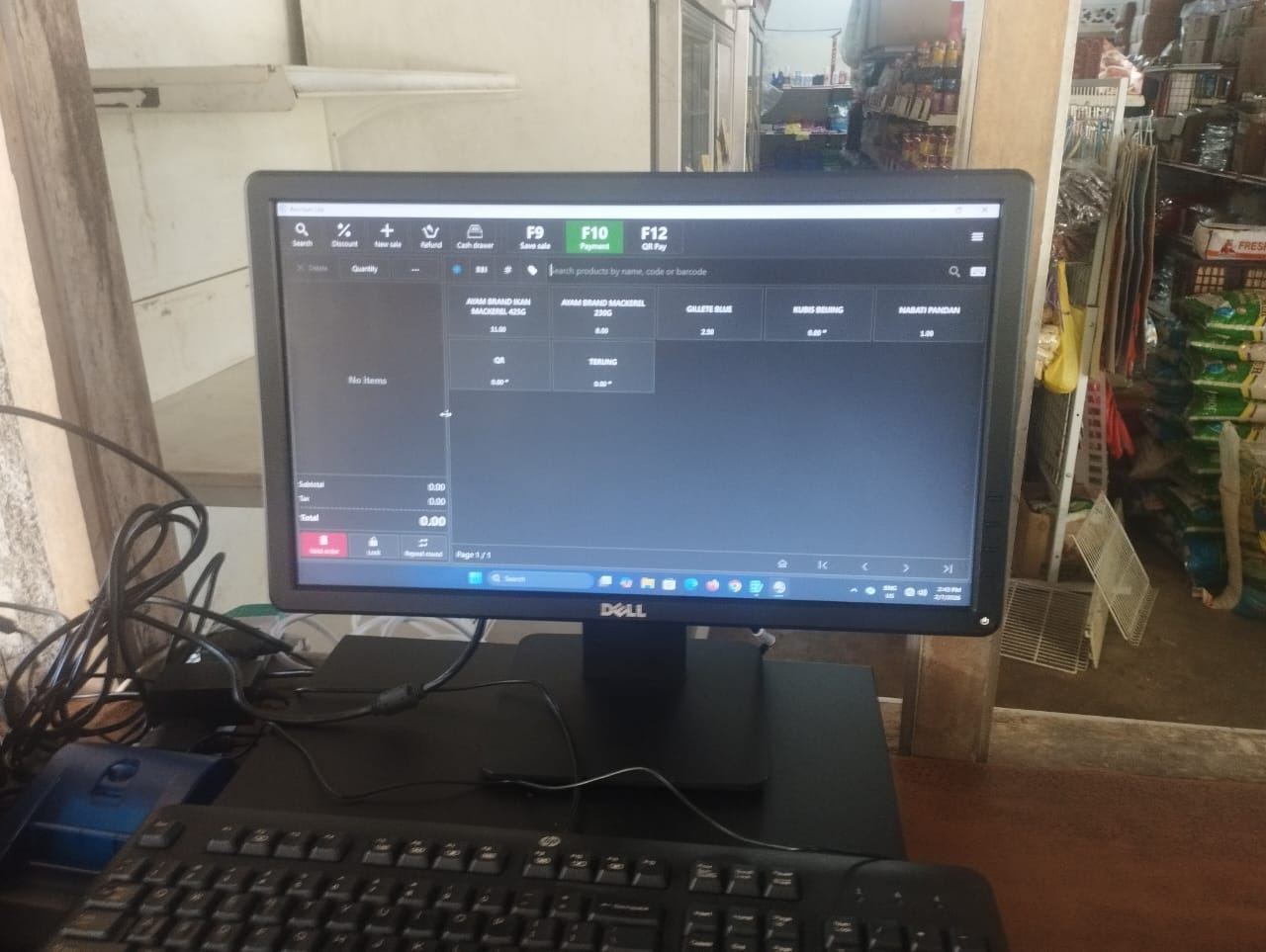 Antara muka sistem DynoPOS di kaunter kedai runcit